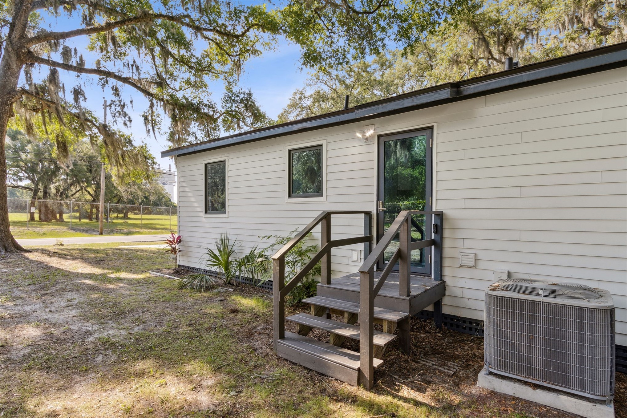 724 North 14th Street Fernandina Beach, FL 32034 - Photo 22 of 34 a view of a house with a yard