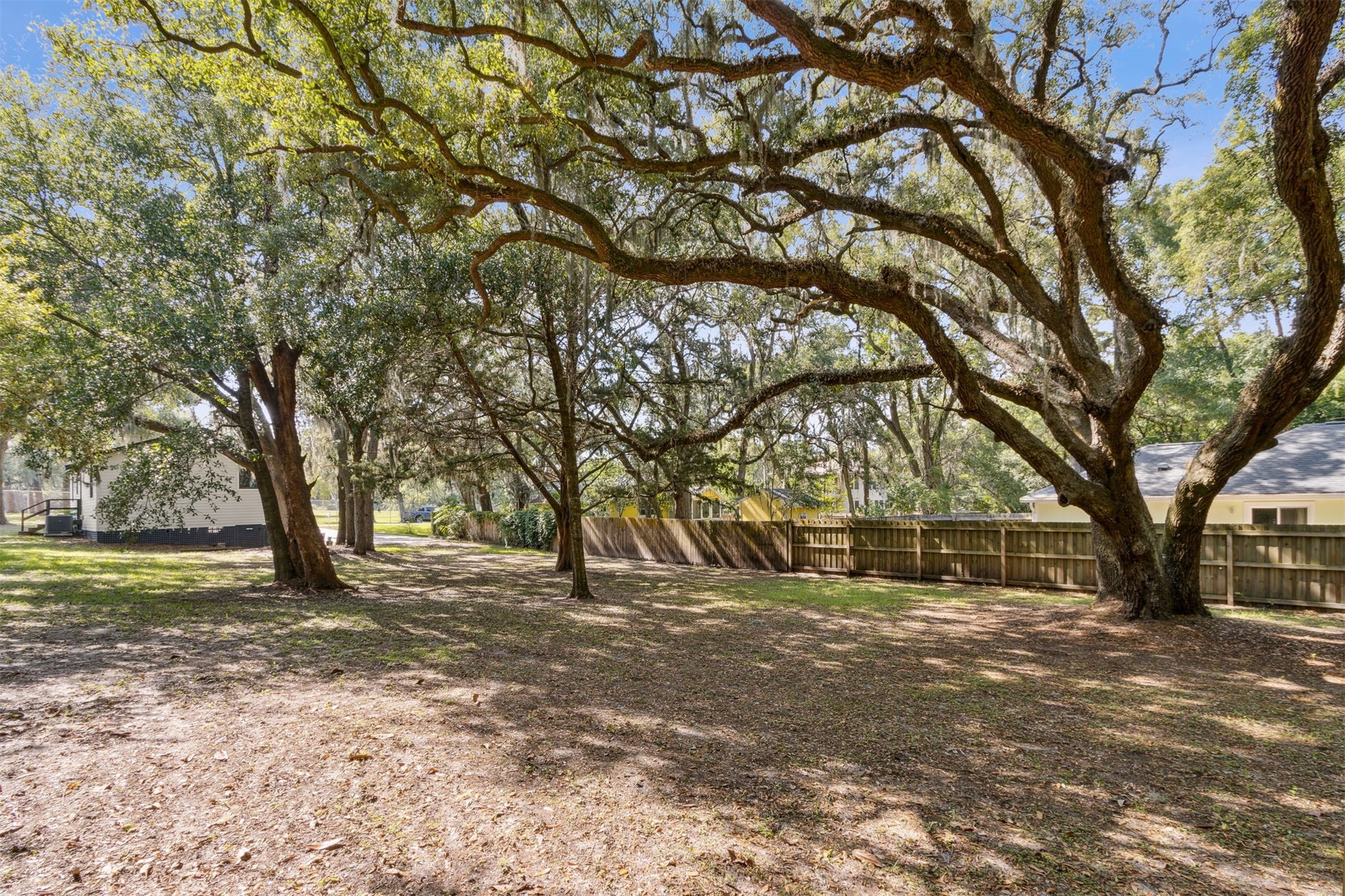 724 North 14th Street Fernandina Beach, FL 32034 - Photo 25 of 34 a house with trees in front of it