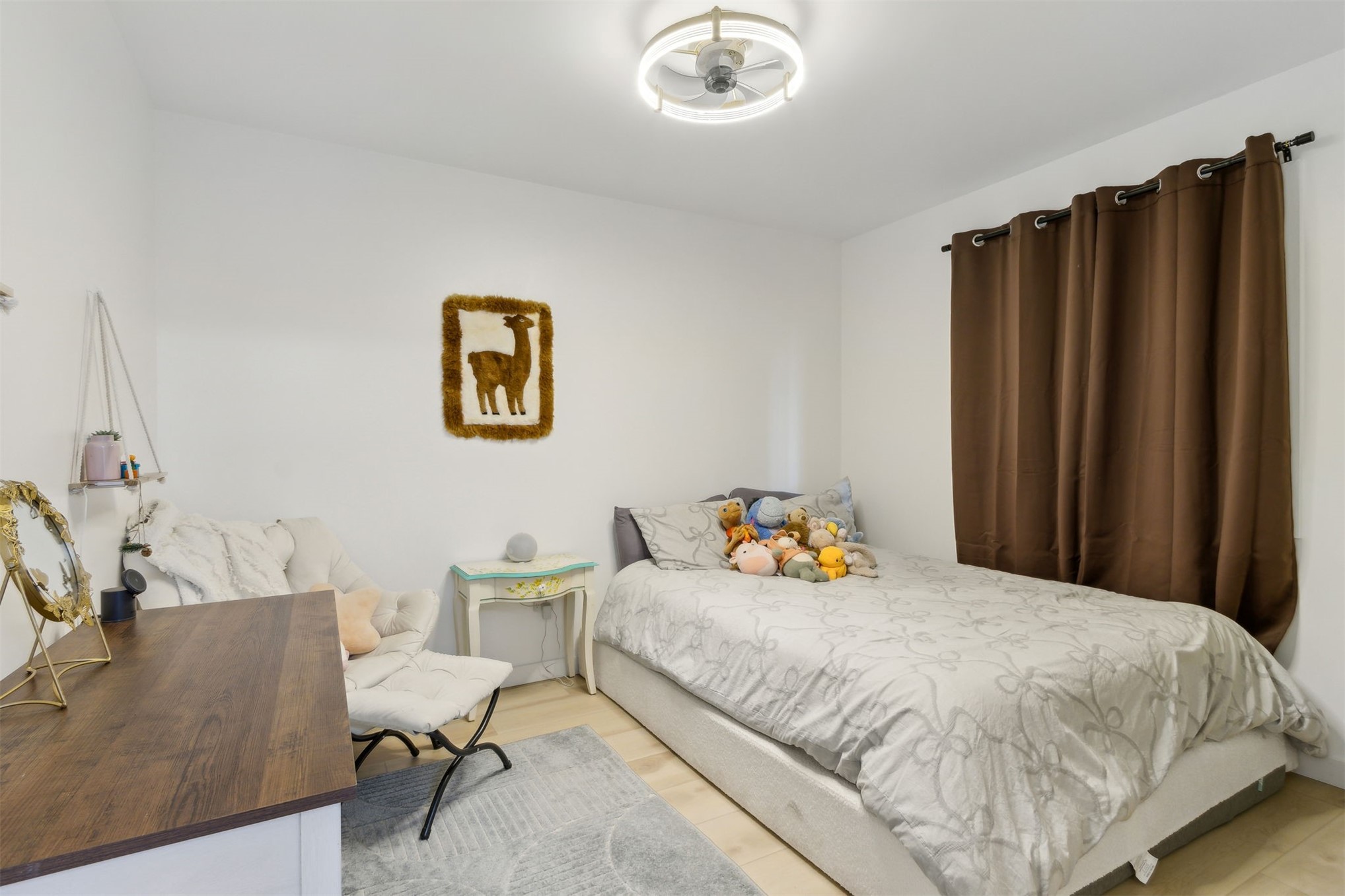 724 North 14th Street Fernandina Beach, FL 32034 - Photo 7 of 34 a bedroom with a bed and table chair