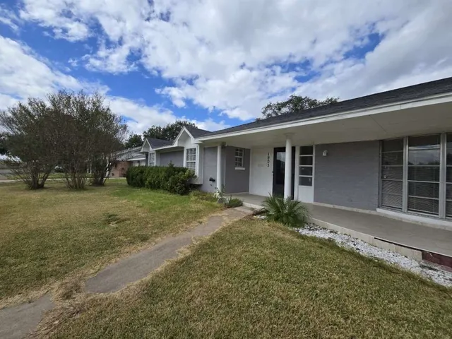 front view of house with a yard