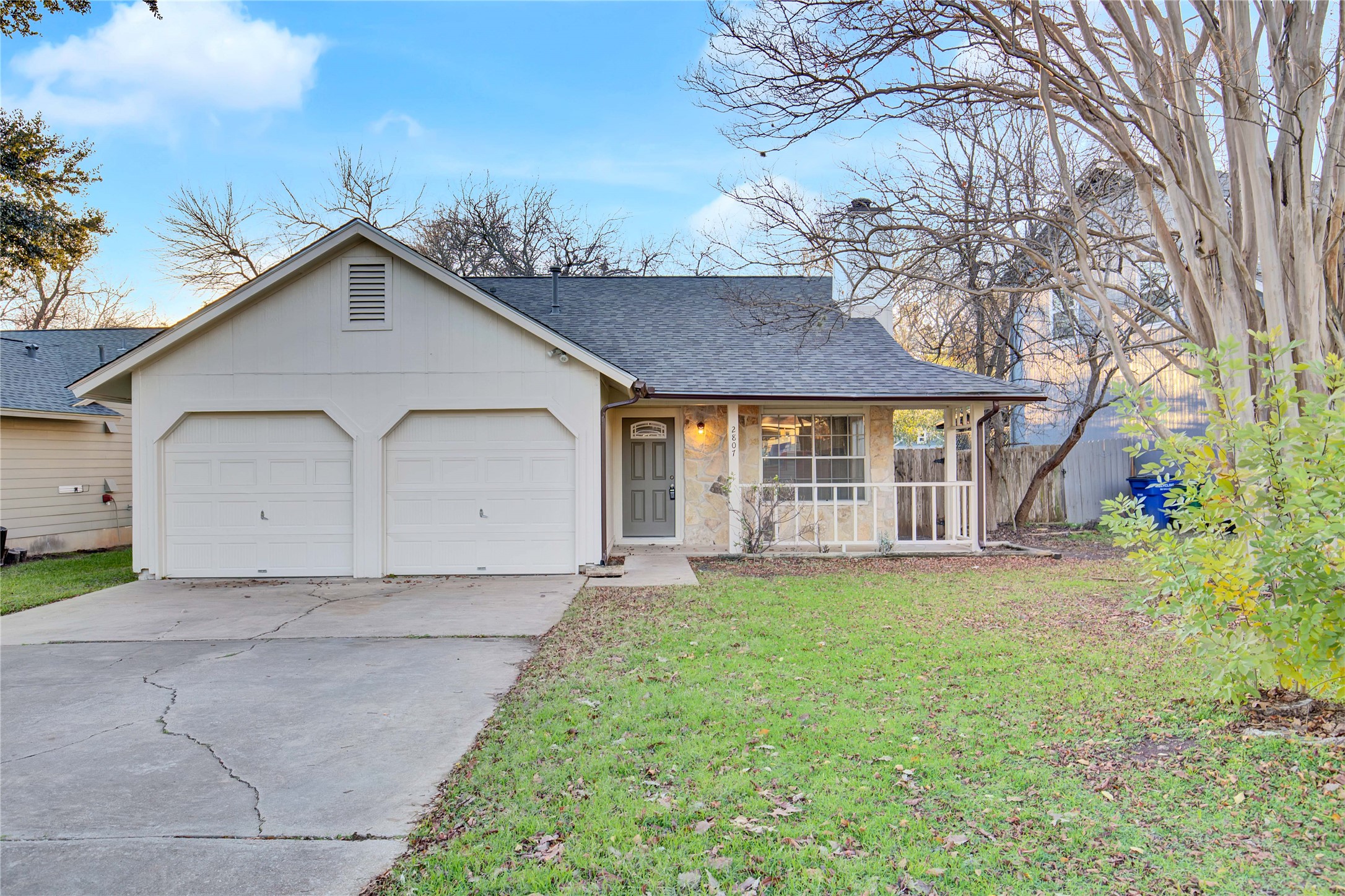 2807 Firecrest Drive Austin, TX 78748 - Photo 20 of 30 a view of a house with a yard and large tree