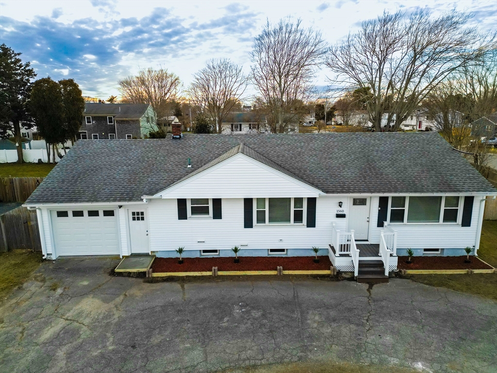 1560 West Main Road Middletown, RI 02842 - Photo 1 of 18 a aerial view of a house with a yard
