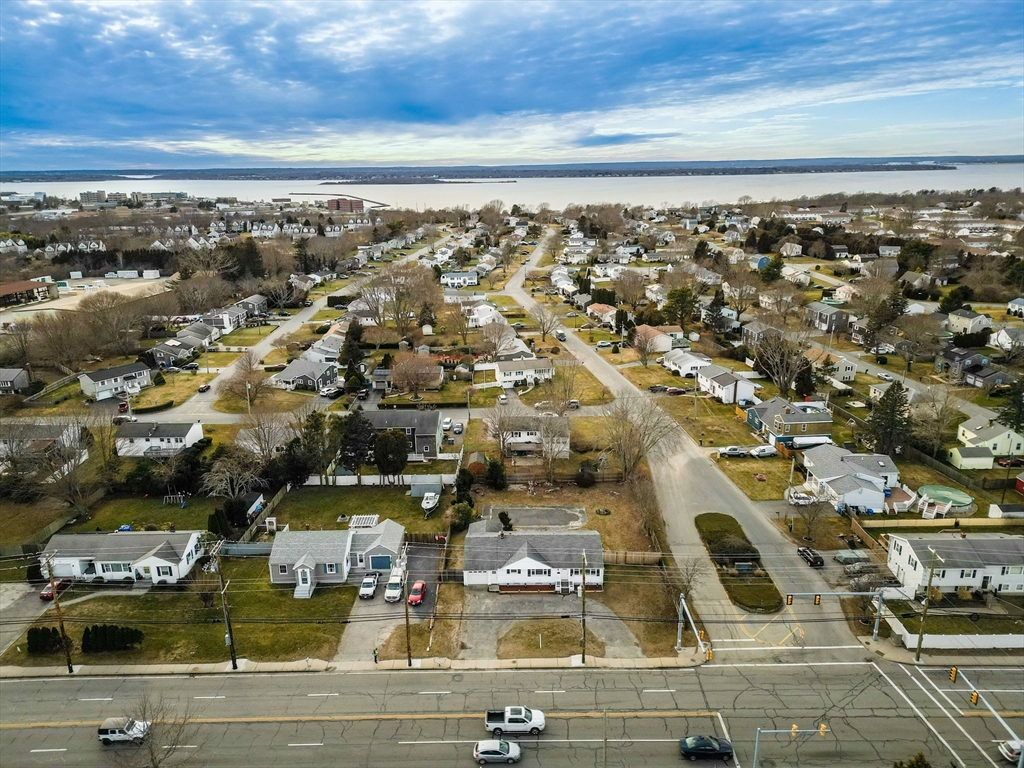 1560 West Main Road Middletown, RI 02842 - Photo 18 of 18 an aerial view of residential houses with outdoor space
