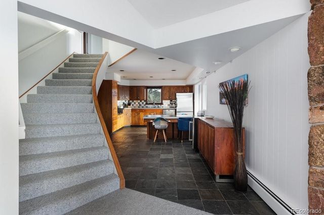 a bedroom with bed and window