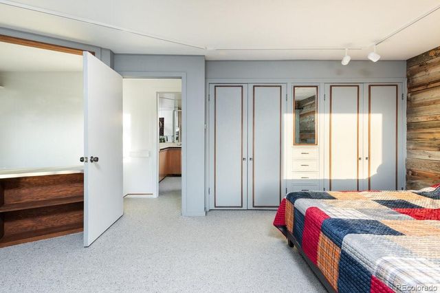 a bathroom with a bathtub and a sink