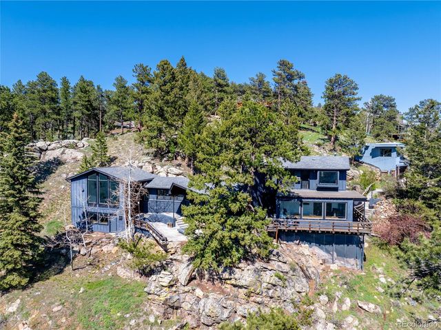 a view of a house with a garden