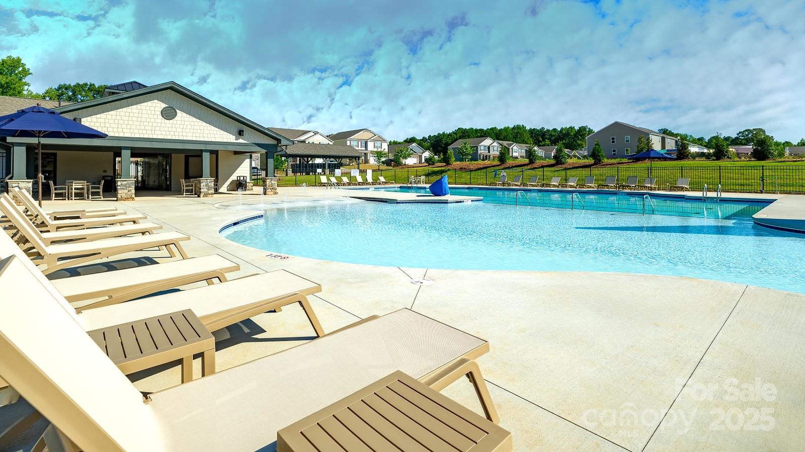 545 Trading Post Lane York, SC 29745 - Photo 22 of 25 a view of a house with pool and a yard