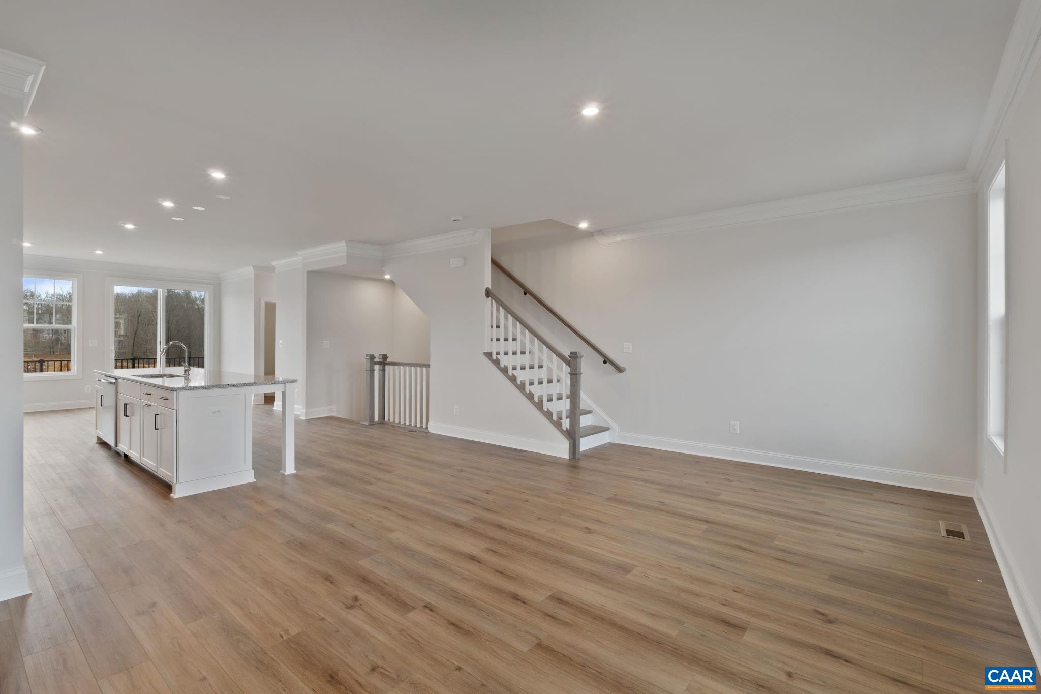 23 Talen Lane Charlottesville, VA 22911 - Photo 23 of 44 a view of an empty room with wooden floor
