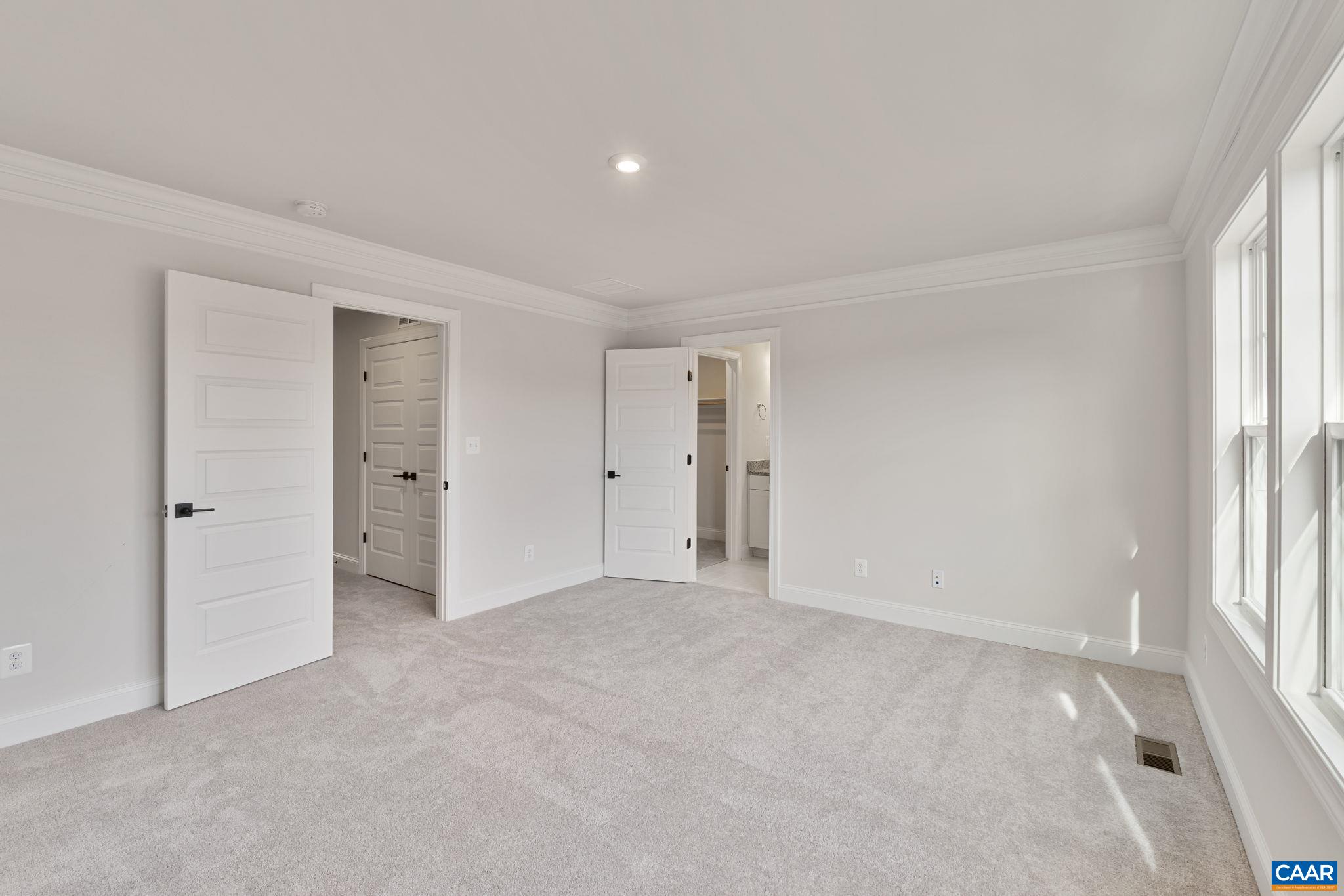 23 Talen Lane Charlottesville, VA 22911 - Photo 27 of 44 an empty room with a window and a kitchen