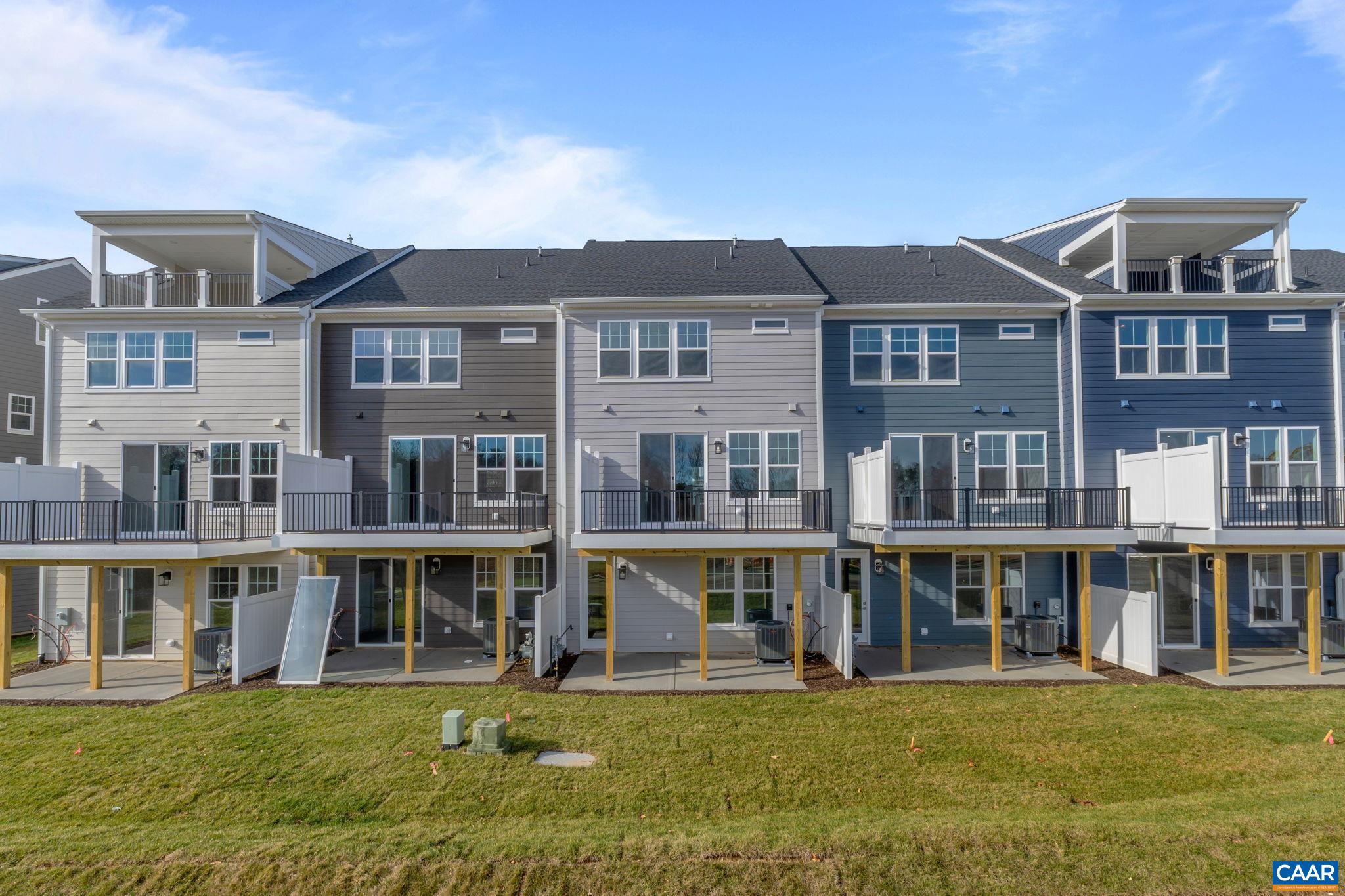 23 Talen Lane Charlottesville, VA 22911 - Photo 39 of 44 a view of a large building with a yard
