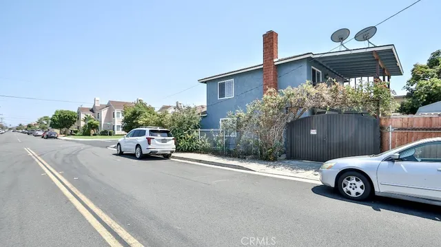 a view of a house with a street