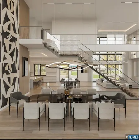 a kitchen with a table chairs and white cabinets