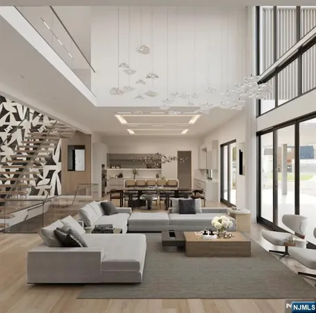 a living room with furniture or couch and a chandelier