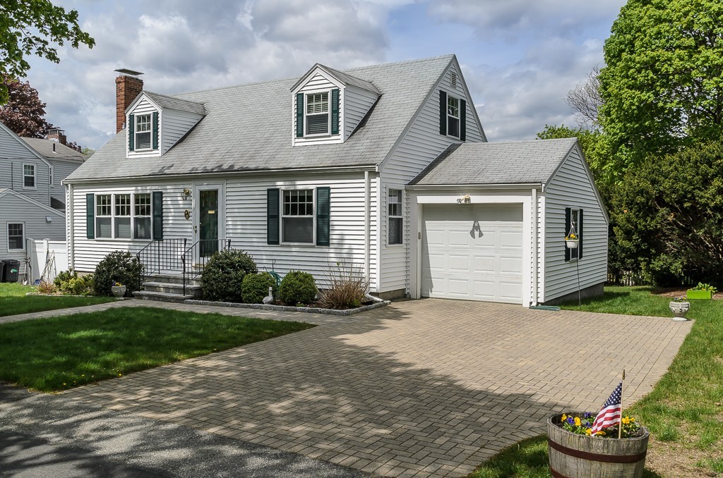 15 Virginia Road Arlington, MA 02476 - Photo 1 of 21 a front view of a house with a yard