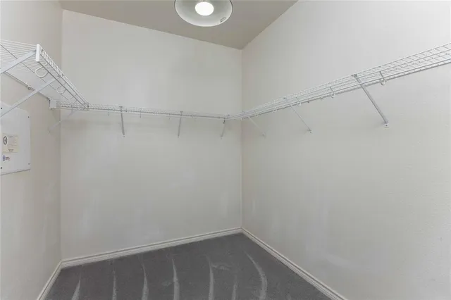 a view of a room with racks on the wall