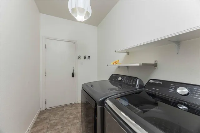 a kitchen that has a sink and a stove