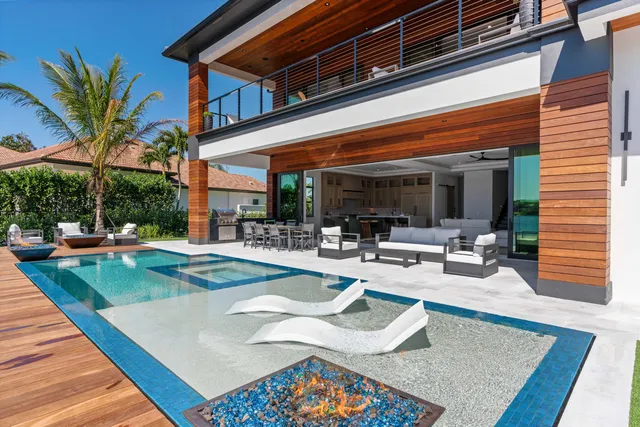 a view of a backyard with a patio