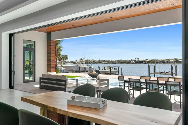 a kitchen with a sink a stove and cabinets