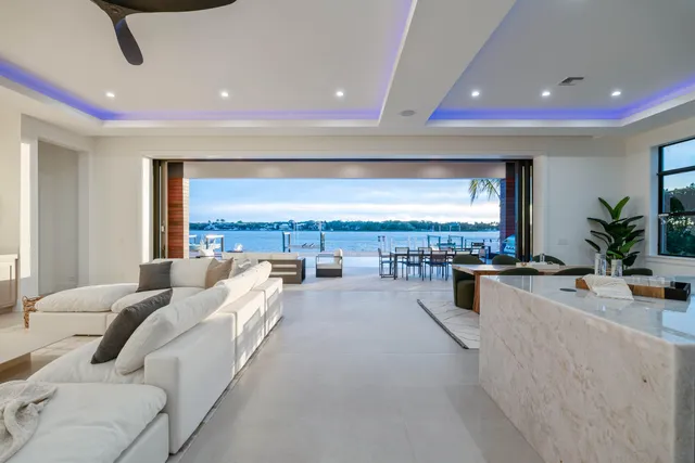 a view of swimming pool with outdoor seating