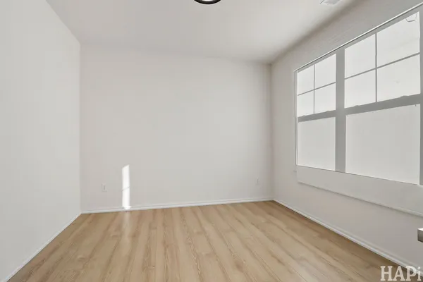 a view of an empty room and window