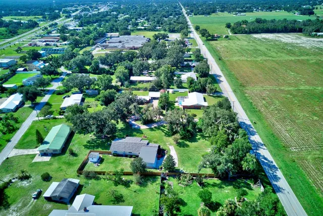 a view of a garden with a houses