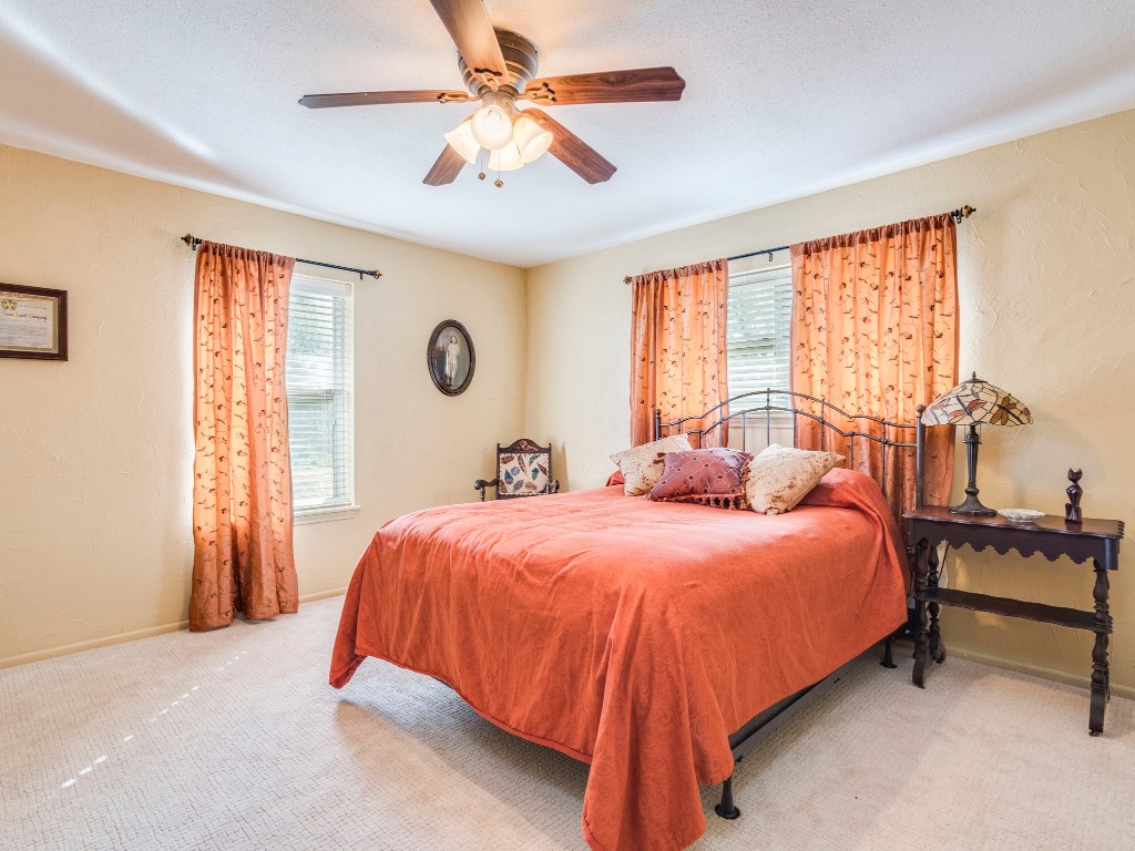 16019 Arbor Trail Buda, TX 78610 - Photo 18 of 40 Secondary bedroom also has great natural light from larger windows.
