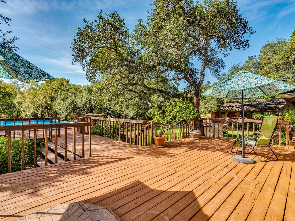 16019 Arbor Trail Buda, TX 78610 - Photo 24 of 40 Step out onto the deck for several incredible vantage points of the yard and beyond.
