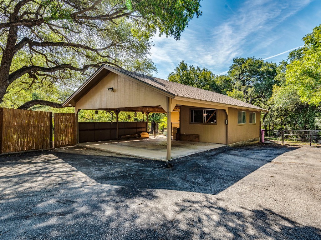 16019 Arbor Trail Buda, TX 78610 - Photo 32 of 40 2 covered spots plus more room around the structure.