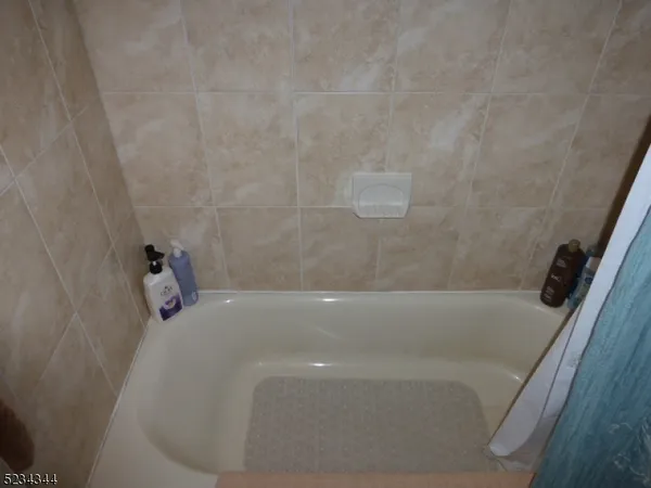 a bathroom with a bathtub