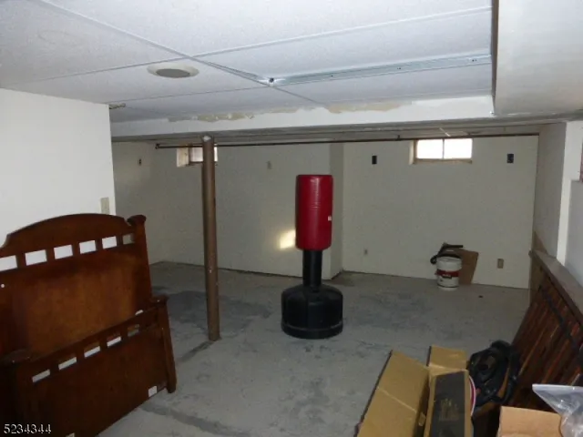 a room with furniture and air hockey table