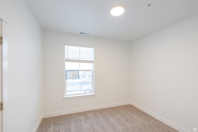 709 West 4500th South, Unit N302 Mapleton, UT 84664 - Photo 7 of 15 Empty room featuring light colored carpet and baseboards