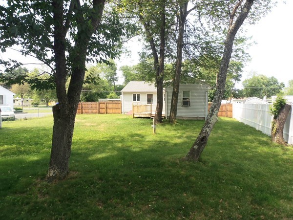 33 Groton Street Springfield, MA 01129 - Photo 5 of 18 a house view with a garden space