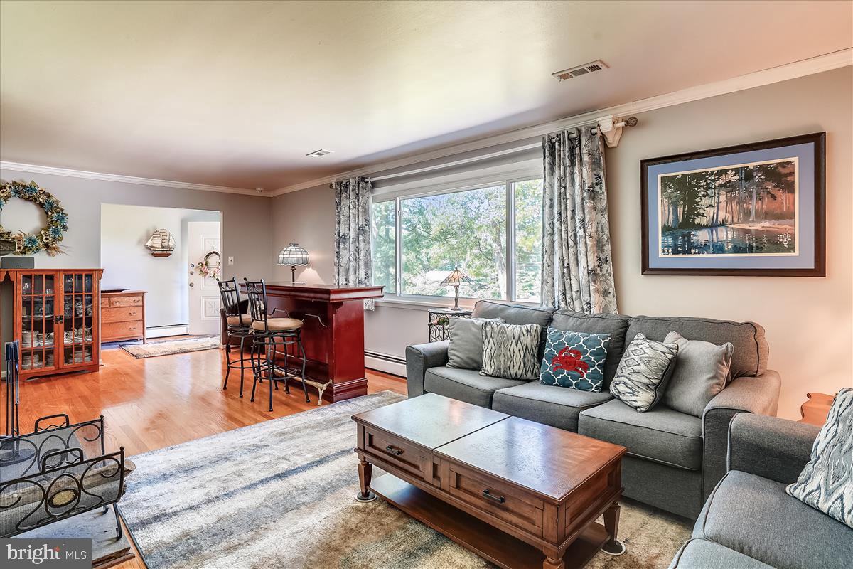 18901 Muncaster Road Derwood, MD 20855 - Photo 15 of 58 Living room (bar not included...it's furniture)