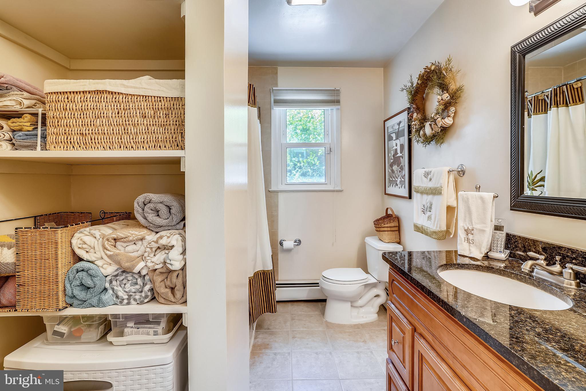 18901 Muncaster Road Derwood, MD 20855 - Photo 37 of 58 Hall Bathroom with open linen