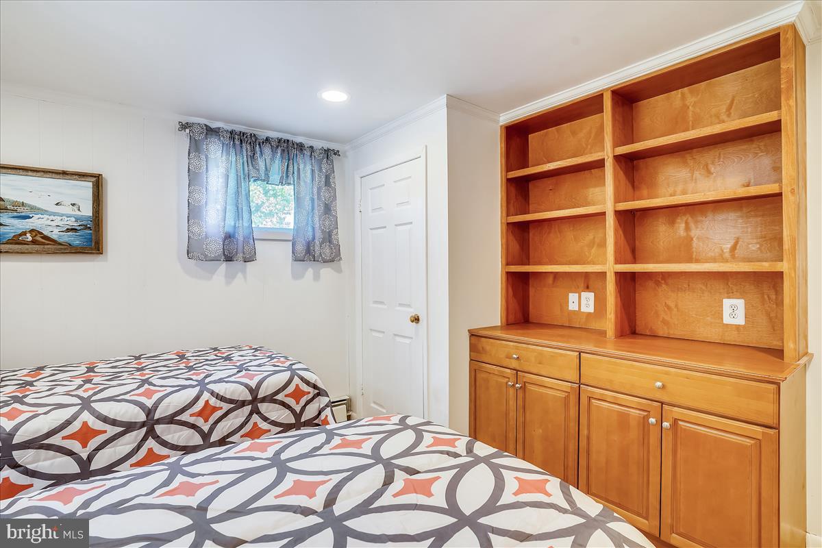 18901 Muncaster Road Derwood, MD 20855 - Photo 41 of 58 Den has built in cabinets