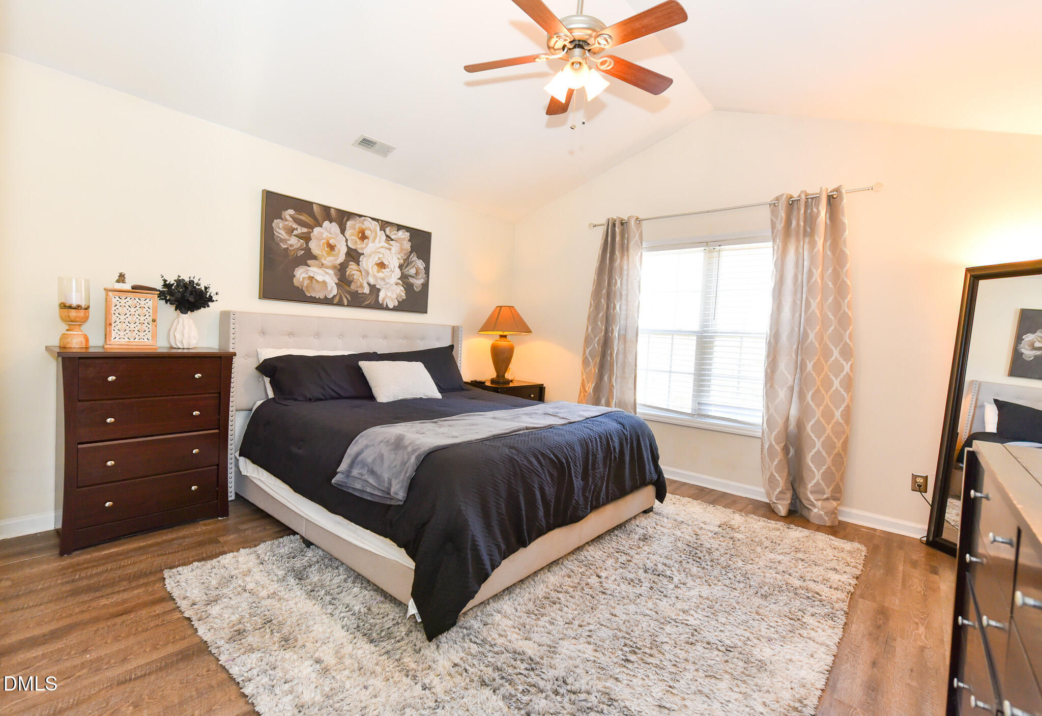 2036 Star Sapphire Drive Raleigh, NC 27610 - Photo 13 of 23 a bedroom with a bed and a window