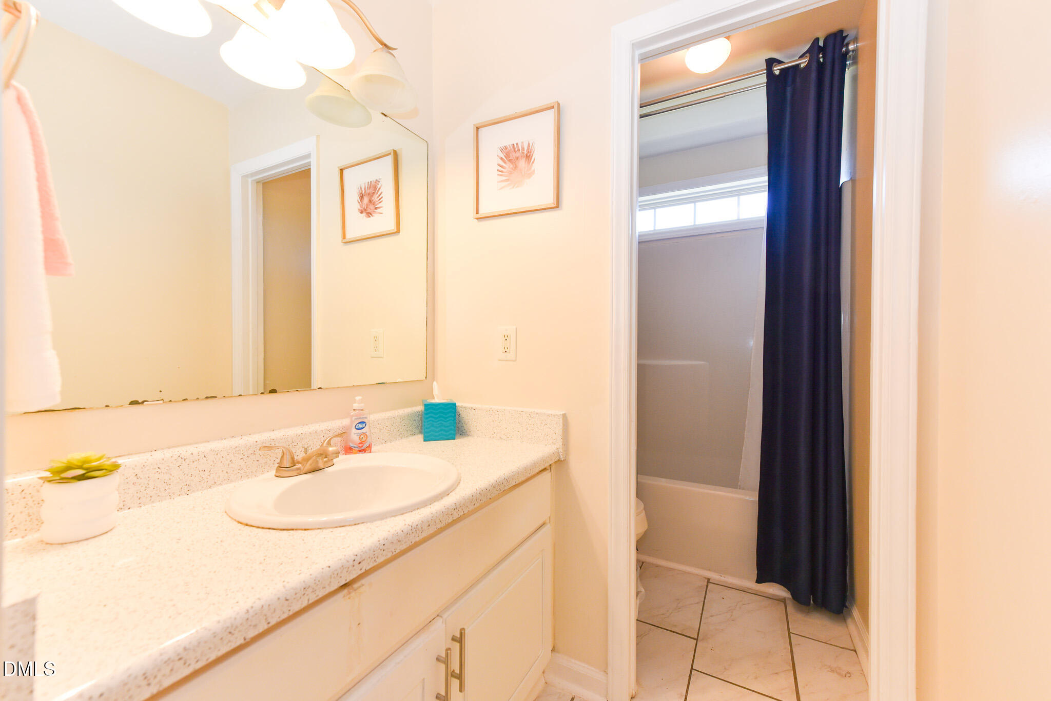 2036 Star Sapphire Drive Raleigh, NC 27610 - Photo 20 of 23 a bathroom with a sink and a mirror