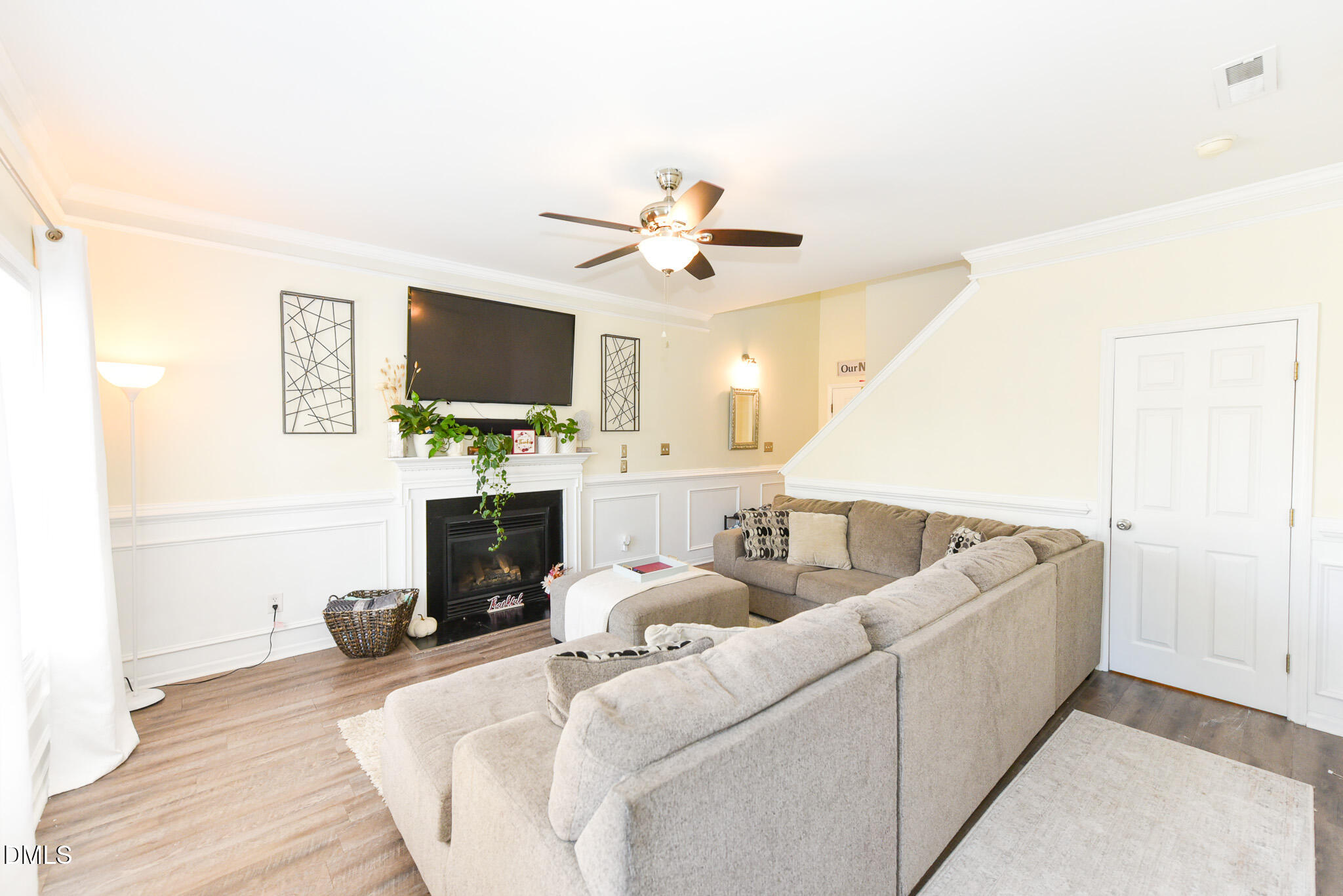 2036 Star Sapphire Drive Raleigh, NC 27610 - Photo 6 of 23 a living room with furniture and a flat screen tv