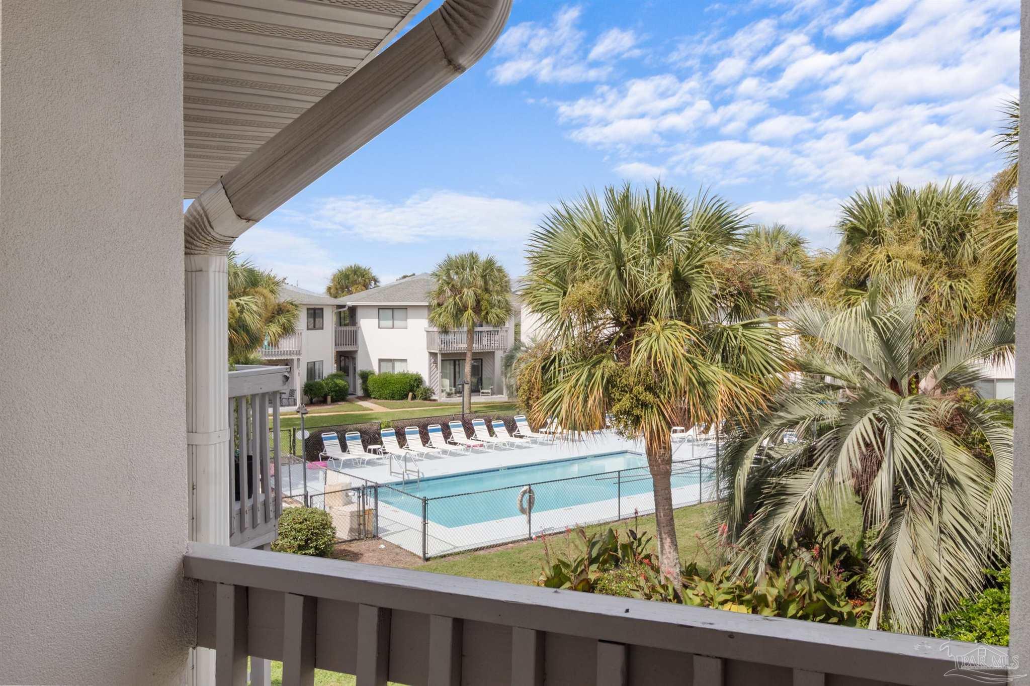 285 Payne Street, Unit 21B Miramar Beach, FL 32550 - Photo 1 of 42 a view of a building from a balcony