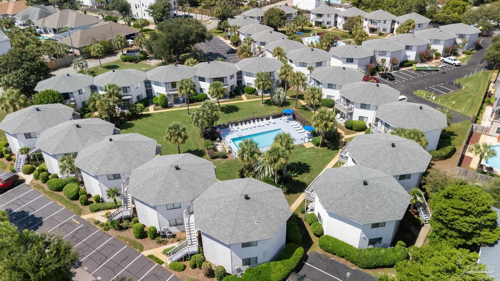 285 Payne Street, Unit 21B Miramar Beach, FL 32550 - Photo 31 of 42 an aerial view of multiple houses with yard