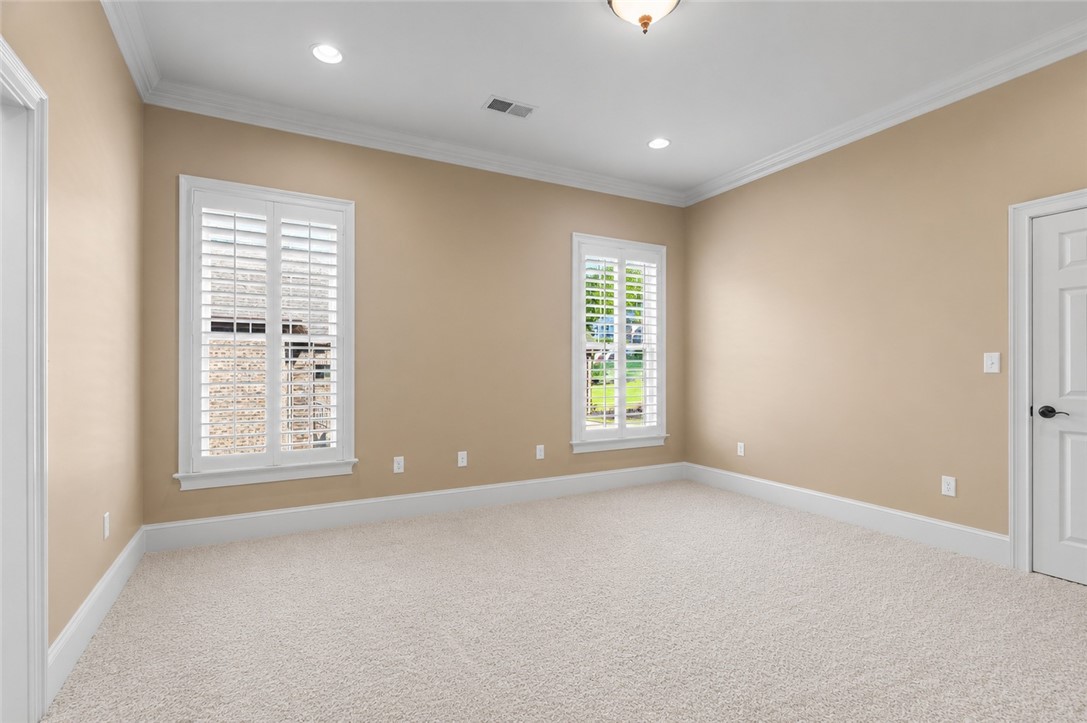 114 Willowbend Drive Anderson, SC 29621 - Photo 31 of 50 This bright room features elegant plantation shutters and recessed lighting, offering comfort and style.