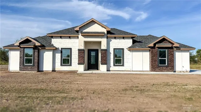 a front view of a house with a porch