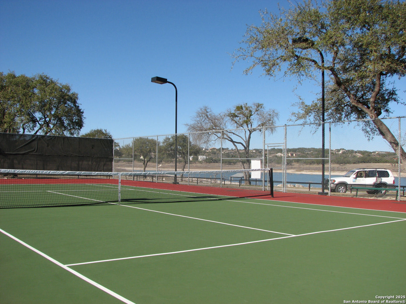 233 Rosinweed Drive Spring Branch, TX 78070 - Photo 17 of 17 a view of a tennis court