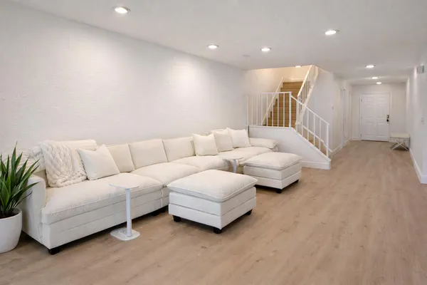a living room with furniture and a couch