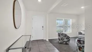 a room with furniture and a window