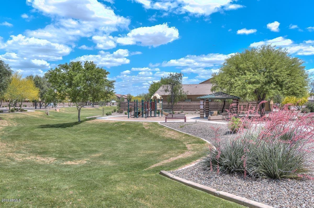 5118 West Apollo Road Laveen, AZ 85339 - Photo 54 of 57 a view of a house with a yard