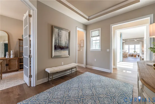 a living room with furniture and a rug