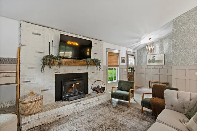 a kitchen with stainless steel appliances granite countertop a stove oven and a refrigerator