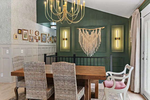 wooden floor in an entryway with a window