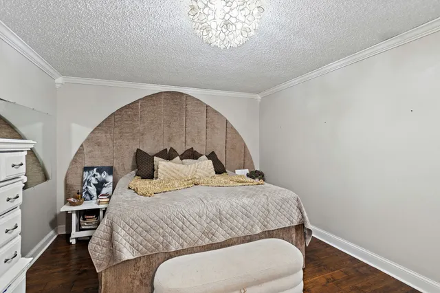 a bathroom with a sink mirror and toilet